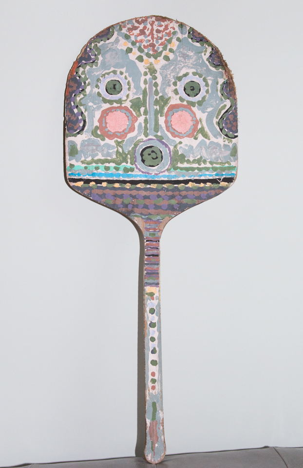 Pizza Paddle is an original wood-painted sculpture measuring 35.5 × 14 inches, completed in 1972 by American Expressionist Landscape painter Bud Holman.